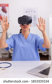 Health Physician Using Medical Inovation Wearing Virtual Reality Goggles In Hospital Office. Therapist Using Medical Innovation Equipment Device Glasses, Future, Medicine, Physician, Healthcare