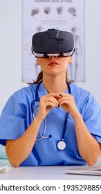 Health Physician Using Medical Inovation Wearing Virtual Reality Goggles In Hospital. Therapist Using Equipment Device Glasses, Future, Medicine, Physician, Healthcare, Professional, Vision, Simulator