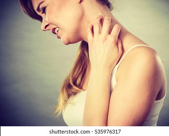 Health Problem, Skin Diseases. Young Woman Scratching Her Itchy Neck With Allergy Rash