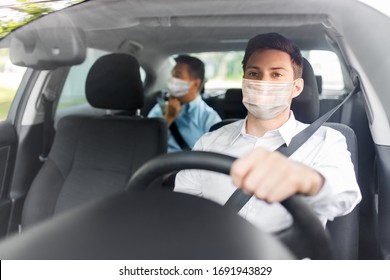 health protection, safety and pandemic concept - male taxi driver wearing face protective medical mask driving car with passenger