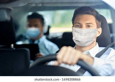 protección de la salud, seguridad y concepto de pandemia - taxista masculino con máscara médica protectora cara camión de conducción con pasajero