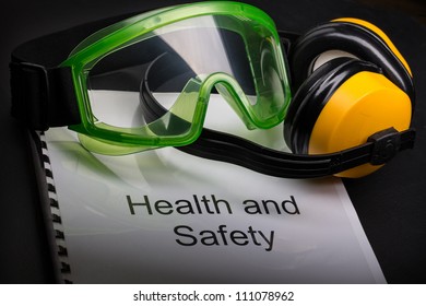 Health And Safety Register With Goggles And Earphones