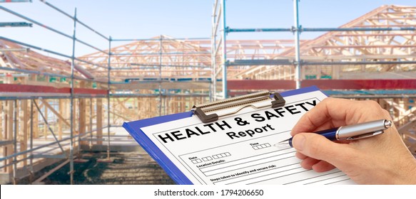 Health and Safety Report Banner hand with clipboard beside new house construction - building concept - Shutterstock ID 1794206650