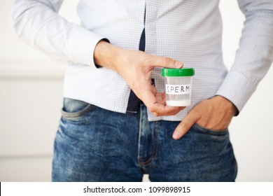 Health. Sample sperm. Donor Sperm Close Concept of Bank Sperm. Infertility A Man Holding in Hands Container With Sperm.