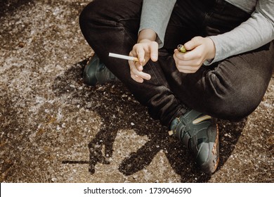 Health And Social Problem Or Issue Concept, School Young Boy Smoking Cigarette Outside, Neglected Child