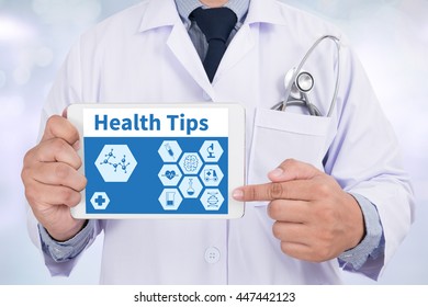 Health Tips Doctor Holding  Digital Tablet