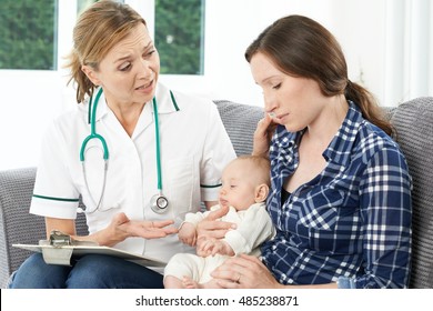 Health Visitor With New Mother Suffering With Depression