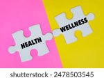 HEALTH, WELLNESS word alphabet letters on puzzle
