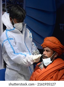 Health Worker Collects Swab Sample Of Sadhu For COVID 19 Testing At Gangasagar Transit Camp Amid Concern Over Spread  Of COVID 19 On January 7,2022 In Calcutta, India. 