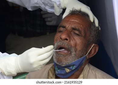 Health Worker Collects Swab Sample Of Pilgrim For COVID 19 Testing At Gangasagar Transit Camp Amid Concern Over Spread  Of COVID 19 On January 7,2022 In Calcutta, India. 