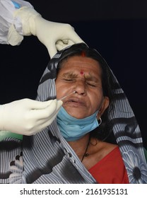 Health Worker Collects Swab Sample Of Pilgrim For COVID 19 Testing At Gangasagar Transit Camp Amid Concern Over Spread  Of COVID 19 On January 7,2022 In Calcutta, India. 