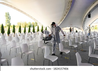 Health Worker Dressed In Protective Suit Disinfect The Venue Of The Public Event Due To An Outbreak Of The Coronavirus Disease COVID-19. September 19, 2020 Vinnytsia, Ukraine.