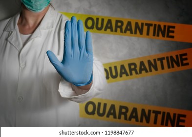 Health worker gesturing stop sign in quarantine.  - Shutterstock ID 1198847677