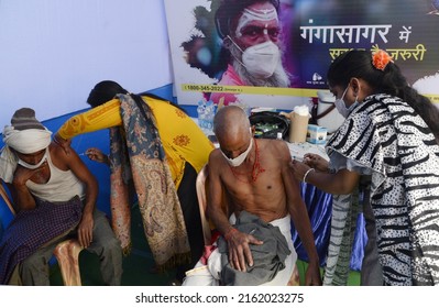 Health Worker Inoculate Dose Of COVID 19 Vaccine To A Pilgrim At Gangasagar Transit Camp, Amid Concern For  Spread Of COVID 19 On January 12,2022 In Calcutta, India. 