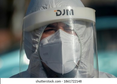 A Health Worker Wearing Personal Protective Equipment During A Free COVID-19 Testing In Los Angeles, Wednesday, Nov. 25, 2020.  (Ringo Chiu Via AP)