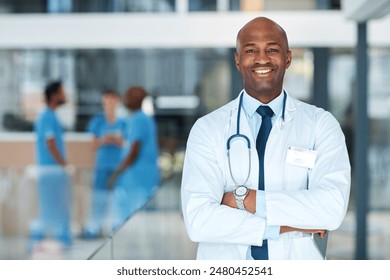 Healthcare, arms crossed and portrait of black man in hospital with trust for confidence, medical support or wellness. Help, medicine and doctor with stethoscope for consulting, career or services - Powered by Shutterstock