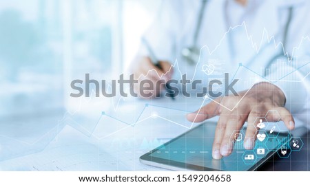 Healthcare business graph data and growth, Medical examination and doctor analyzing medical report network connection on tablet screen.