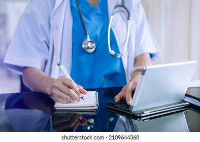 Healthcare Business Graph And Medical Examination And Businessman Analyzing Data And Growth Chart On Laptop Background