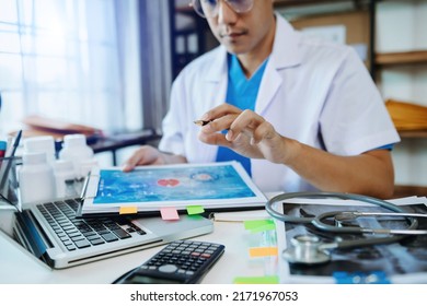 Healthcare Business Graph And Medical Examination And Businessman Analyzing Data And Growth Chart On Laptop Background