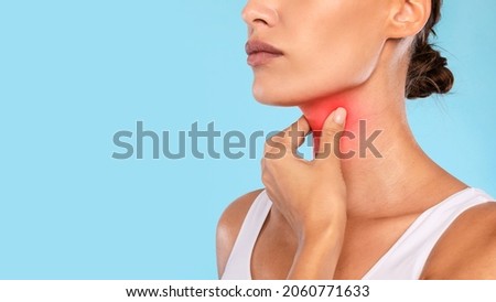 Healthcare, Cold and People Concept. Closeup of unrecognizable sick woman suffering from sore throat, ill lady touching neck with hand, inflamed red zone, banner, panorama, free copy space