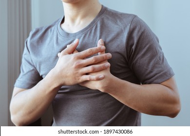 Healthcare concept, A man has severe heart pain and chest pain suffocating.