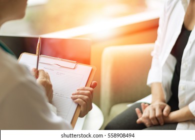 Healthcare Concept Of Professional Psychologist Doctor Consult In Psychotherapy Session Or Counsel Diagnosis Health. Major Depressive Disorder Patient (MDD) With Physician.