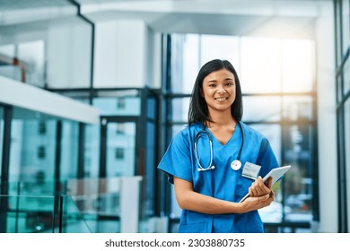 Healthcare, confidence and portrait of woman doctor or nurse with tablet in hospital for support in medical work. Health care career, wellness and medicine, confident nursing professional with smile. - Powered by Shutterstock