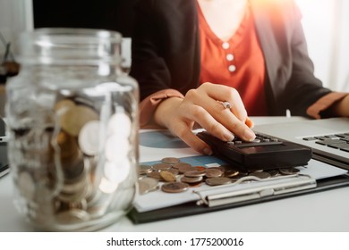Healthcare costs and fees concept.Hand of smart doctor used a calculator for medical costs in modern hospital - Shutterstock ID 1775200016