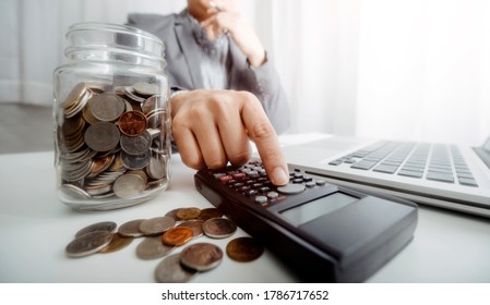 Healthcare costs and fees concept.Hand of smart doctor used a calculator for medical costs in modern hospital - Shutterstock ID 1786717652