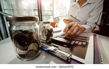 Healthcare costs and fees concept.Hand of smart doctor used a calculator for medical costs in modern hospital - Shutterstock ID 1841619073