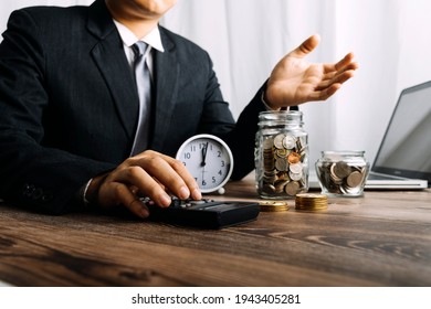 Healthcare costs and fees concept.Hand of smart doctor used a calculator for medical costs in modern hospital - Powered by Shutterstock