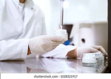 Healthcare creme production in laboratory. Creme products in lab. Healthcare industry.