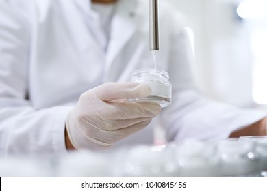 Healthcare creme production in laboratory. Creme products in lab. Healthcare industry.
