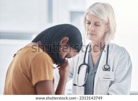 Healthcare, empathy and doctor with a woman after diagnosis of cancer or sickness. Sad, comfort and grieving patient crying for results in a consultation with a female medical worker in the hospital.