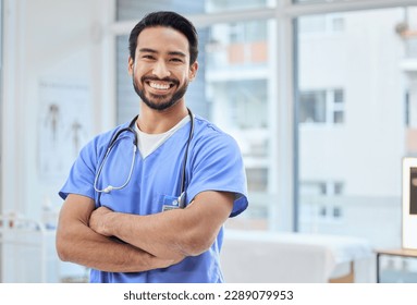 Healthcare, happy doctor and portrait of man in clinic for insurance, wellness and medical service. Cardiologist, hospital and health worker smile with crossed arms for care, consulting and help