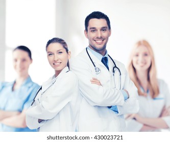 Healthcare, Hospital And Medical Concept - Young Team Or Group Of Doctors