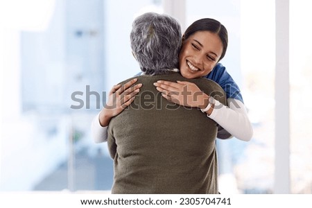 Healthcare, hug and nurse with senior woman, care and diagnosis with positive news, help and happiness. Female person, employee or medical professional with patient, lady and embrace for consultation