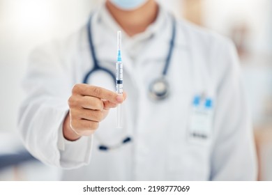 Healthcare, Innovation And Covid Vaccine By Doctor Holding Cure At Hospital. Male Research Leader With Medical Discovery, Breakthrough And Medicine, Offer Miracle Disease Immunity, Cancer Treatment