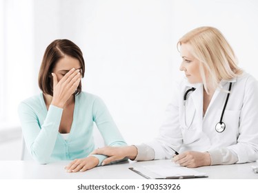 Healthcare And Medical Concept - Doctor With Patient In Hospital