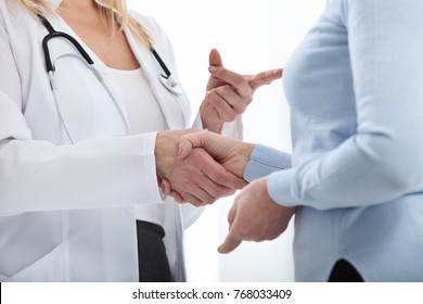 Healthcare and medical concept - doctor with patient in hospital