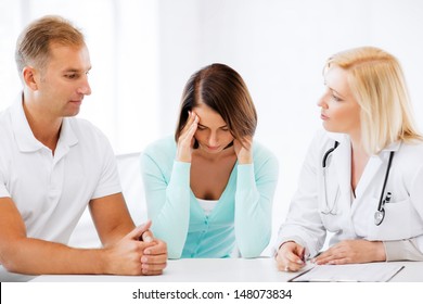 healthcare and medical concept - doctor with patients in cabinet - Powered by Shutterstock