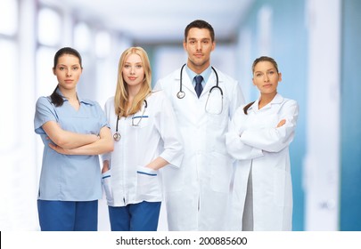 Healthcare And Medical Concept - Young Team Or Group Of Doctors