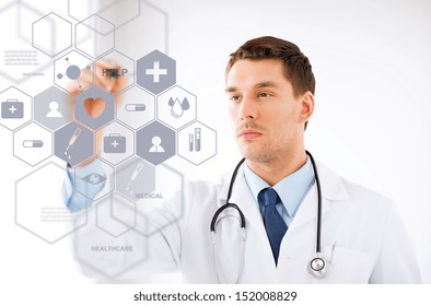 Healthcare, Medical And Future Technology Concept - Male Doctor With Stethoscope And Virtual Screen