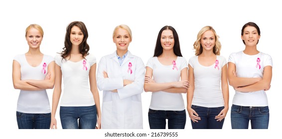 Healthcare And Medicine Concept - Group Of Smiling Women And Doctor In Blank T-shirts With Pink Breast Cancer Awareness Ribbons