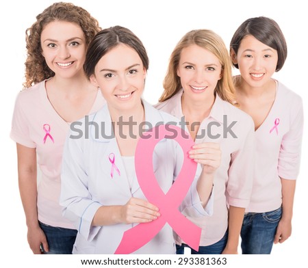 Healthcare and medicine concept - group of smiling women and doctor in blank t-shirts with pink breast cancer awareness ribbons.