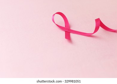healthcare and medicine concept. pink breast cancer awareness ribbon. - Shutterstock ID 329981051