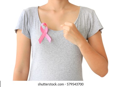 healthcare and medicine concept. Woman hand holding pink breast cancer awareness ribbon. - Shutterstock ID 579543700