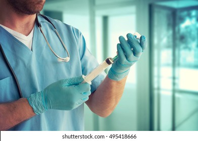 Healthcare And Medicine. Doctor with syringe is preparing for injection