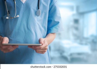 Healthcare And Medicine. Doctor Using A Digital Tablet