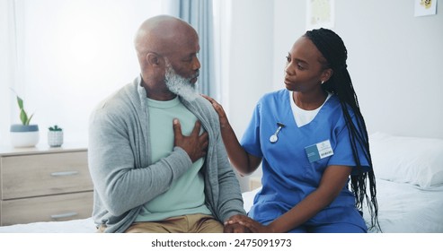 Healthcare, nurse and mature man with consultation in hospital for medical service, support or advice. Clinic, professional and black people with discussion on bed for heart disease, stroke and help